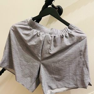 B Brand: Lulu Lemon
Style: Lined surge shorts
Color: Gray
Size: M
Inseam: 6”